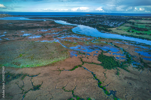 Aerial footage looking downstream towards the mouth of the Barwon River near Barwon Heads, Victoria, Australia. May 2022
 photo