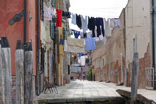 Fototapeta Naklejka Na Ścianę i Meble -  A street of Venice full of Laundry