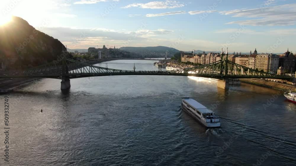 Aerial shot of Danube river cruise at sunset