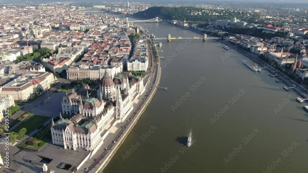 Flight over Hungarian Parliament Building and Danube river in Budapest, Hungary Flight over Hungarian Parliament Building and Danube river in Budapest, Hungary