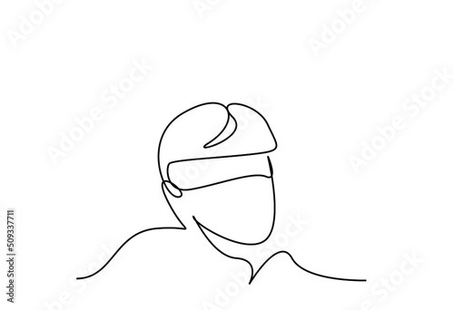 A young male blindfolded with a cloth. a person wearing a sleeping eye patch