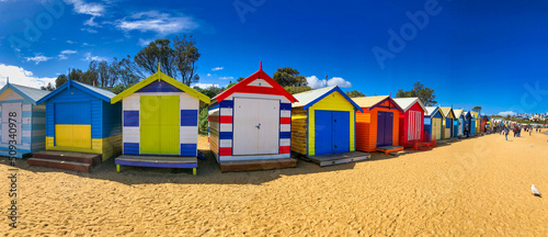 Brighton Beach, Australia - September 7, 2018: Brighton Beach colorful wooden cabins on a sunny day, panoramic view