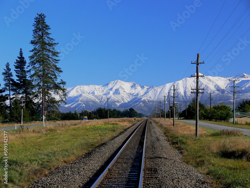 Southern Alps with snow and train track, Springfield, New Zealand
