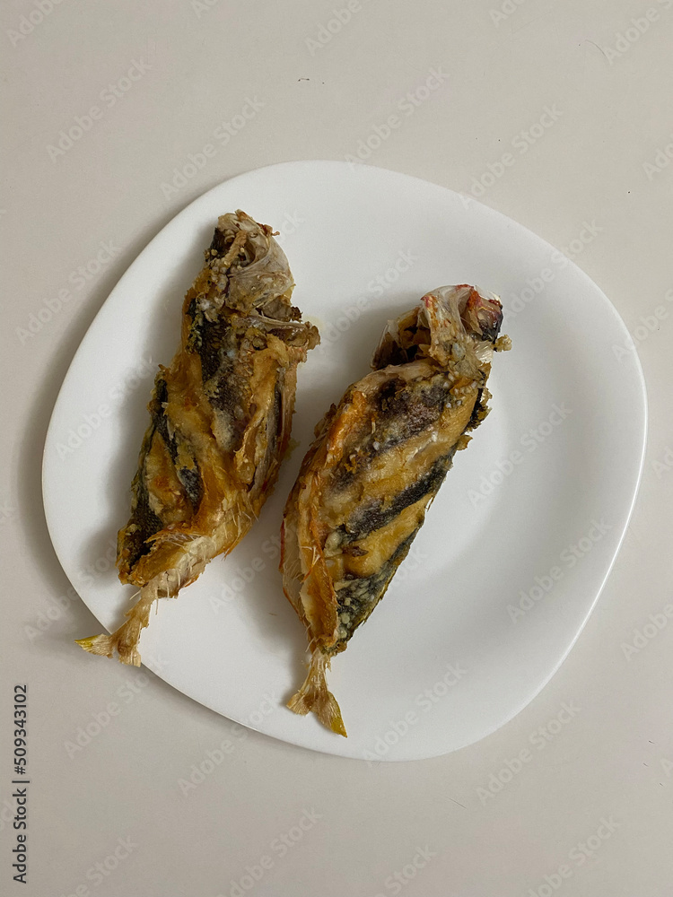 Photo of Dalagang Bukid Fish or Yellow Tail Fusilier Fish on Plate
