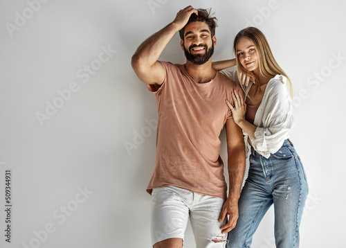 Portrait of heterosexual couple looking at camera and smiling