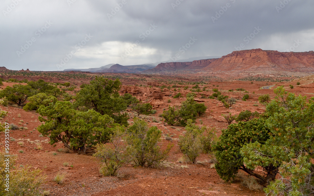 rain and stormy clouds over desert valley (Torrey, Wayne county, Utah)