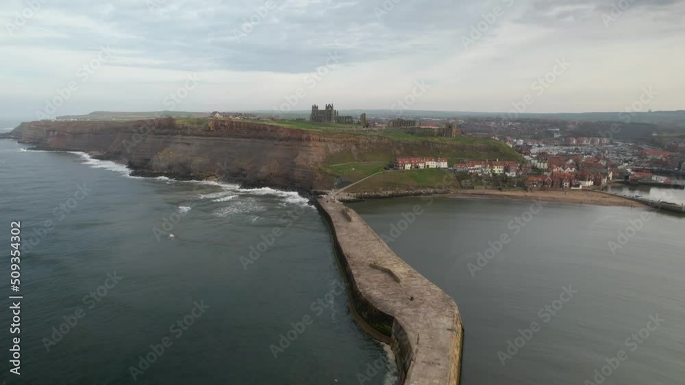 Cinematic view of the iconic Harbour at Whitby. It is popular as tourist spot.North Yorkshire, England, UK Cinematic view of the iconic Harbour at Whitby. It is popular as tourist spot.North Yorkshire, England, UK