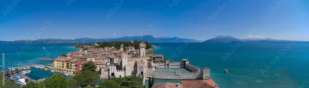 Sirmione aerial panorama of Lake Garda, Italy. Aerial view of the historic castle on the water.