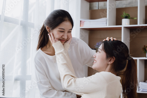 LGBTQ Lesbian. Young asian woman couple love together at home. Smiling and happy time moments. LGBTQ concept.