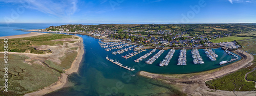Aerial panoramic image of Carteret marina and estuary on a sunny day in France photo