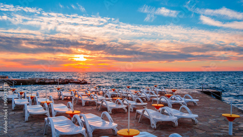 Sunset on the beach with clouds photo