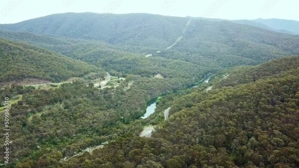 Aerial view of the Mitta Mitta River just below the Dartmouth Dam wall, Victoria, Australia. November 2021. Aerial view of the Mitta Mitta River just below the Dartmouth Dam wall, Victoria, Australia. November 2021.