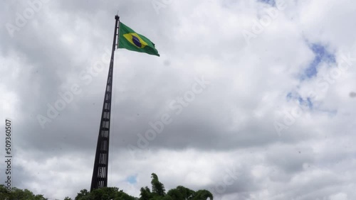flag of brazil in brasilia at the three powers square photo