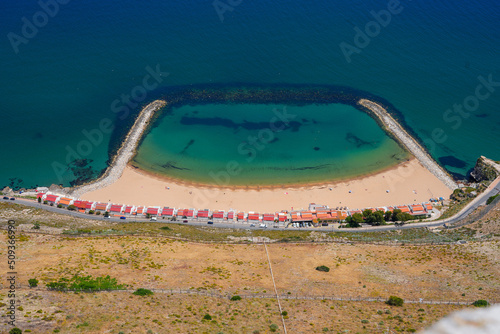 Aerial view of the Sandy Bay beach located on the eastern side of the Gibraltar peninsula - Artificial beach enclosed by two breakwater in the Mediterranean Sea