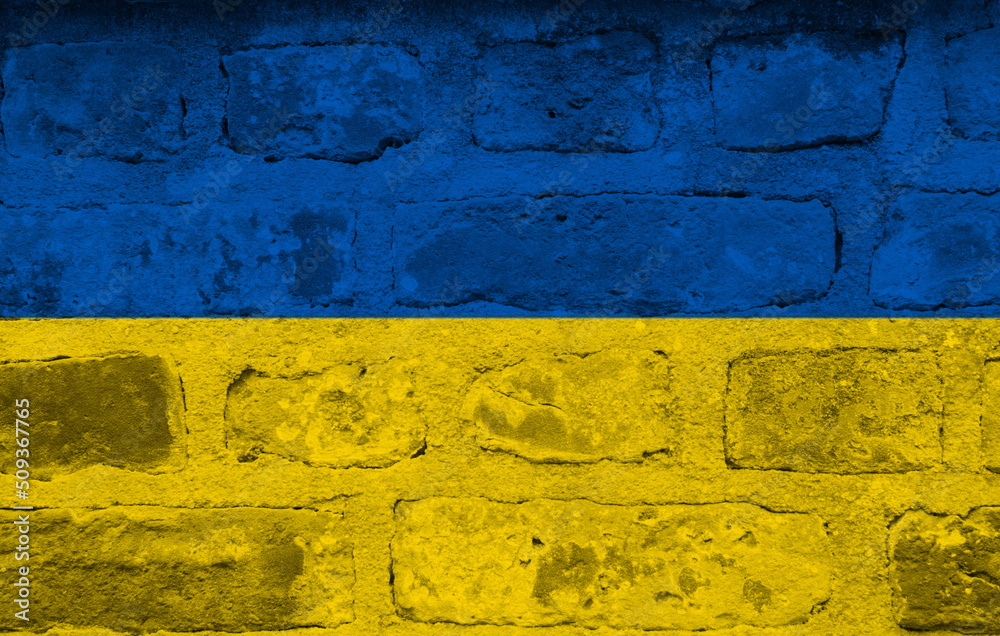 Flag of Ukraine on old grunge wall in background