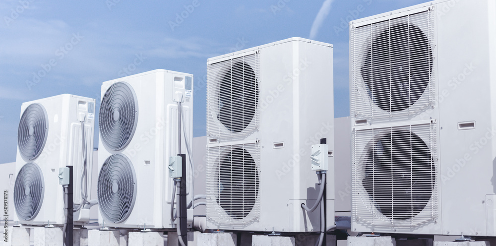 Air conditioning (HVAC) on the roof of the building Air conditioner cooling compressor. Air conditioning (HVAC) on the roof of the building Air conditioner cooling compressor.