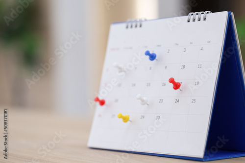 Calendar in office,Business management event,business plan targeted marketing activities, media relations advertising Calender Page With Tacks/Business Concept.
