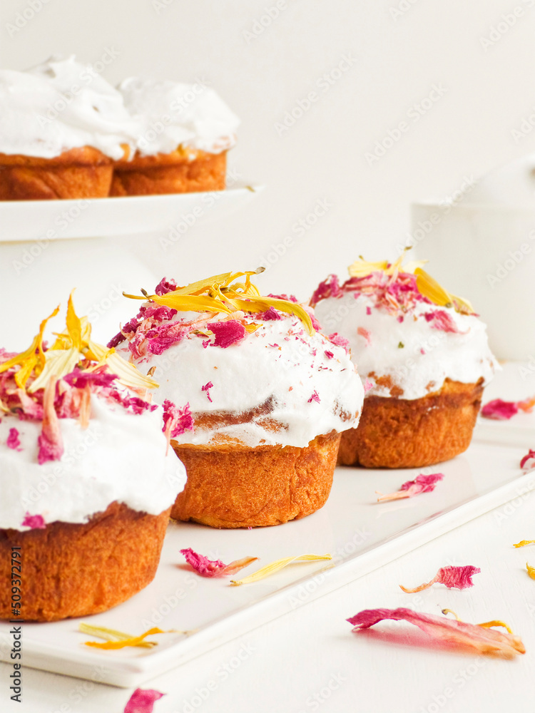 Cake with edible flowers and whipped cream. Shallow dof . Cake with edible flowers and whipped cream. Shallow dof .