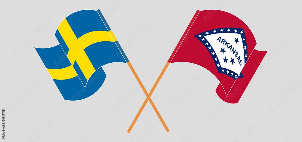 Crossed and waving flags of Sweden and The State of Arkansas
