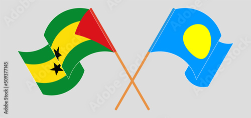 Crossed and waving flags of Sao Tome and Principe and Palau