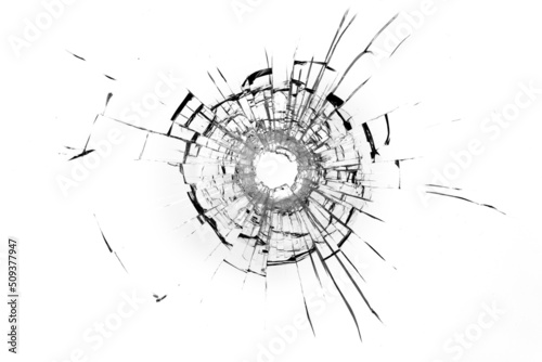 Fotografering Bullet hole in the rock. Broken window, cracks.