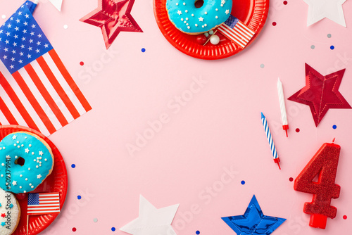 Fourth of July concept. Top view photo of US national flag stars number 4 candle plates with glazed donuts candles and confetti on isolated pastel pink background with copyspace in the middle