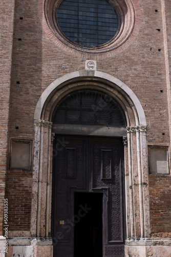 large wooden door with arch architecture italy ancient city © dyachenkopro