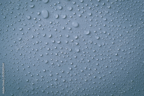 The concept of raindrops falling on gray background Abstract wet grey blue surface with bubbles on the surface Realistic pure water droplet water drops for creative banner design