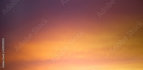 Bright orange sky at sunset, low key. Warm tones. © maykal