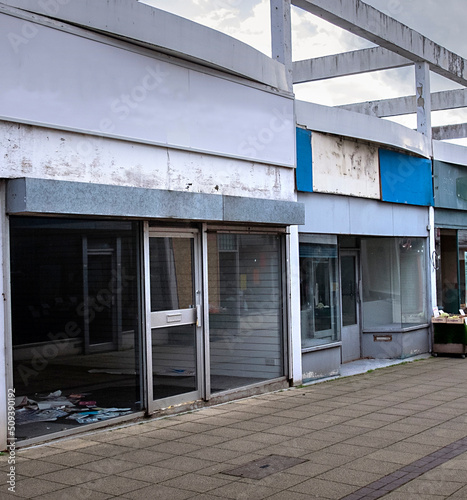 Shops closed and empty depicting the dying high street in the UK. photo