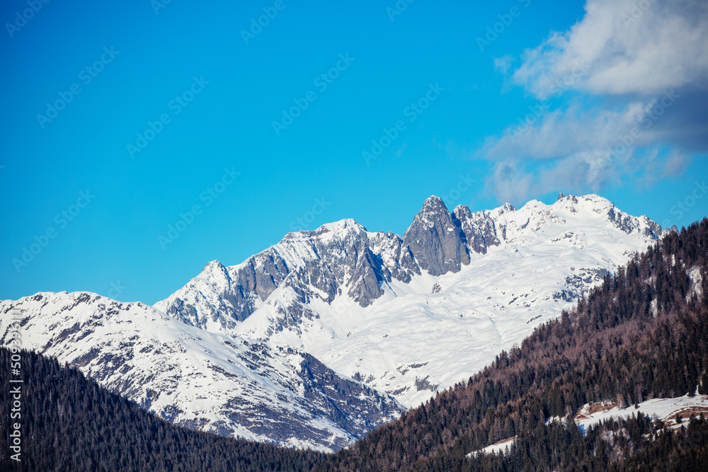 Summits in snow Mont Blanc Alps mountains massif over blue sky