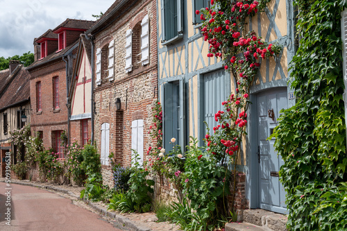 Fototapeta Naklejka Na Ścianę i Meble -  One of most beautiful french villages, Gerberoy - small historical village with half-timbered houses and colorful roses flowers, France
