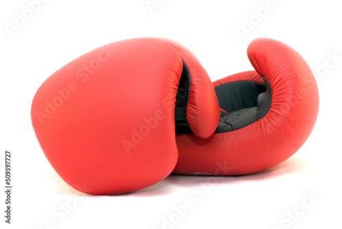 Red and black leather boxing gloves isolated on white