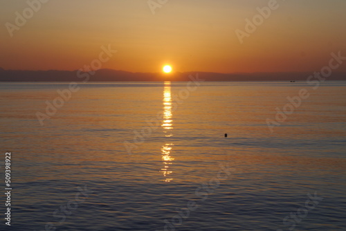 Colorful sunrise on the sea © AnnyKen
