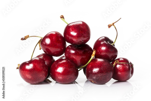 fresh organic cherries isolated on white background