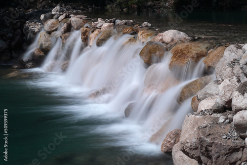 Fototapeta Naklejka Na Ścianę i Meble -  A waterfall blurred with long exposure