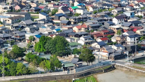 Pullback from dense residential neighborhood to dry unplanted fields in countryside