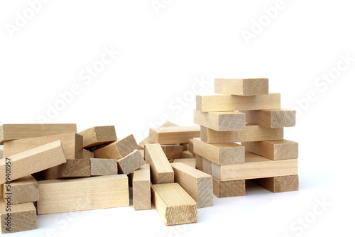A bunch of jenga game details lie on a white background.