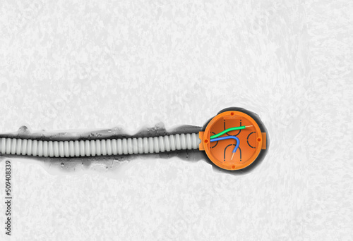 Electrical wire in the corrugated pipe and mounting box for the socket. Vector illustration