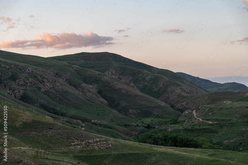 Beautiful landscape in the morning. Panoramic view on the mountains and hill at the sunrise.