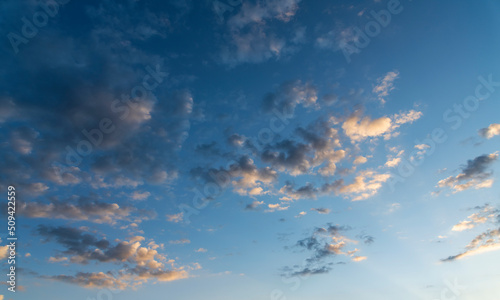 Beautiful bright sunrise with clouds. Sky background.