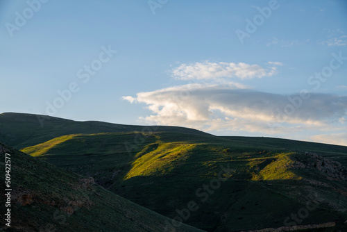 Beautiful landscape in the morning. Panoramic view on the mountains and hill at the sunrise.