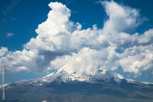 Beautiful view of the Ararat mountains and clouds sky.