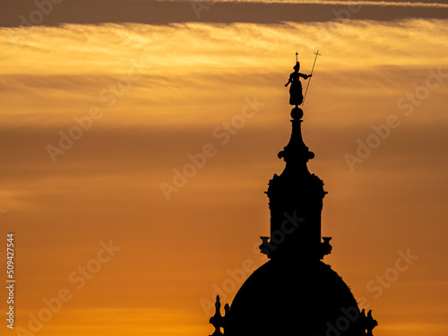 Beautiful sunset in Bilbao, city of the Basque country, with the silhouette of the church of San Anton.