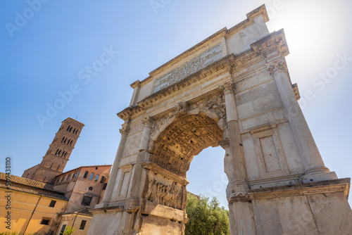 The Arch of Titus in The Roman Forum (latin name Forum Romanum), Rome, Italy, Europe. photo