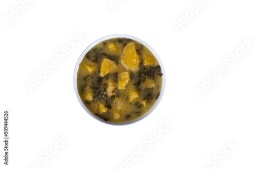 Bowl of Cassava Mandioca Aipim Macaxeira Soup with Herbs photo