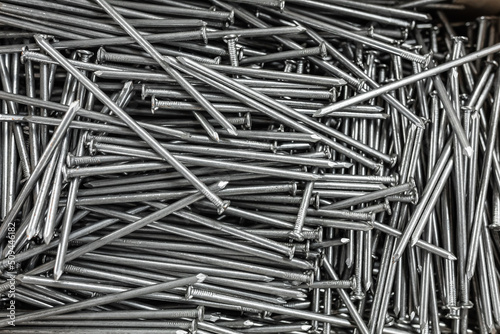 Iron nails in a box. Lots of metal products in the warehouse.