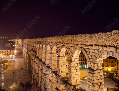 Night photo of the aqueduct of Segovia in a summer night, Spain.