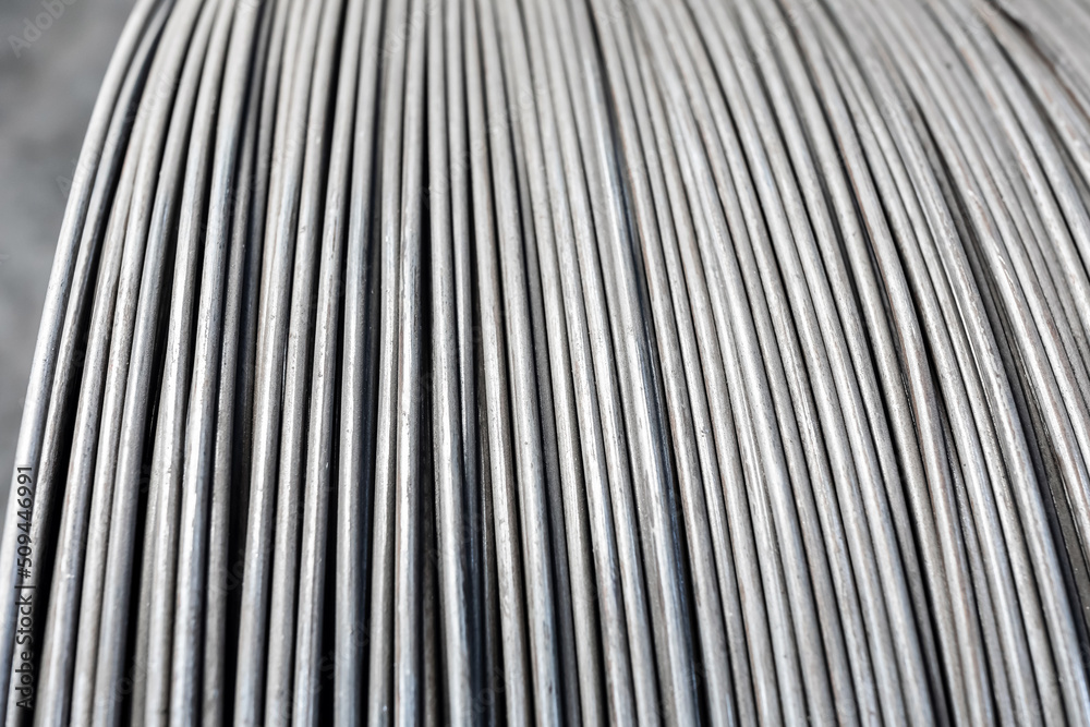 Iron wire in roll. Warehouse of metal products. Close-up Iron wire in roll. Warehouse of metal products. Close-up