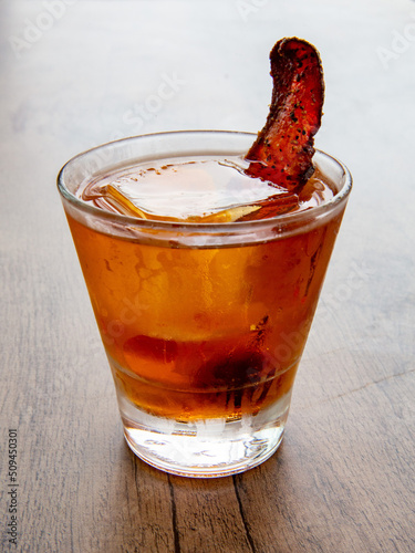Old Fashioned Cocktail with Ice and Bacon